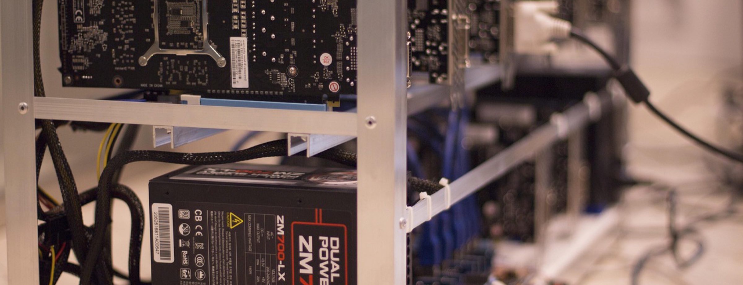 Racks of miners in a hosted facility